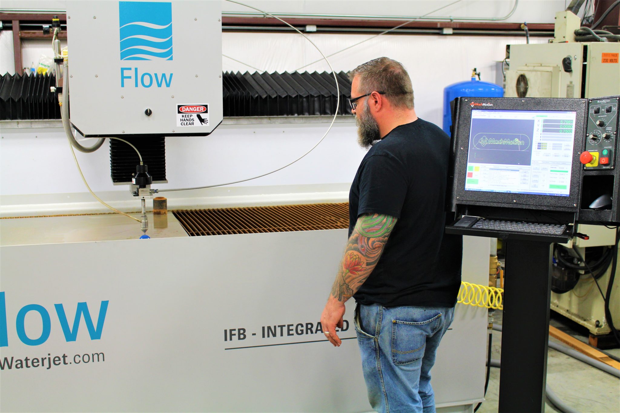 FLOW FLYING BRIDGE CNC WATERJET MACHINE WITH CONTROL STAND MachMotion